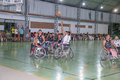 Basquete em cadeiras de rodas da show em Nova Mutum Paraná