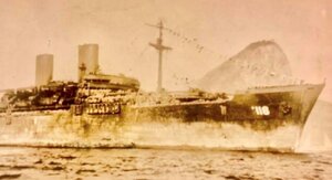 U.S. troop transport vessel, referred to in historical memory as “General Truman,” anchored in the Port of Rio de Janeiro in 1945, with Sugarloaf Mountain visible in the background, prior to departure for the Italian theater of operations. - Gente de Opinião